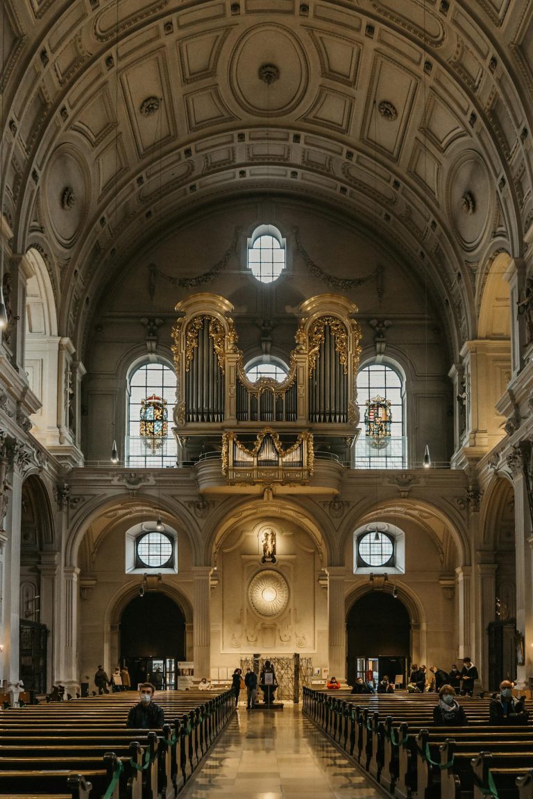 Interior view of St. Michael's Church in Munich featuring the grand organ and stunning architecture.